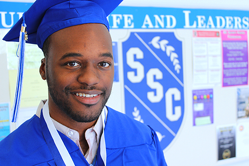 Photo of a black male graduate