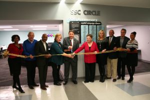 SSC’s Robin Rihacek, Executive Director of Enrollment & Retention Services and Frank Zuccarelli cut the ribbon to officially open SSC Circle, a new student assistance facility.