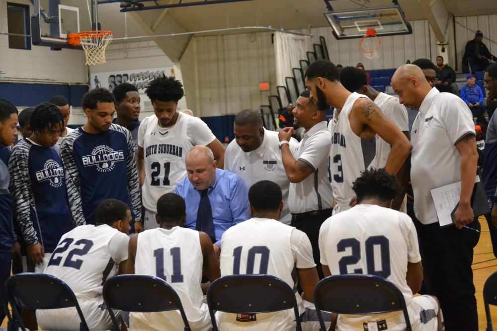 Team in huddle | South Suburban College