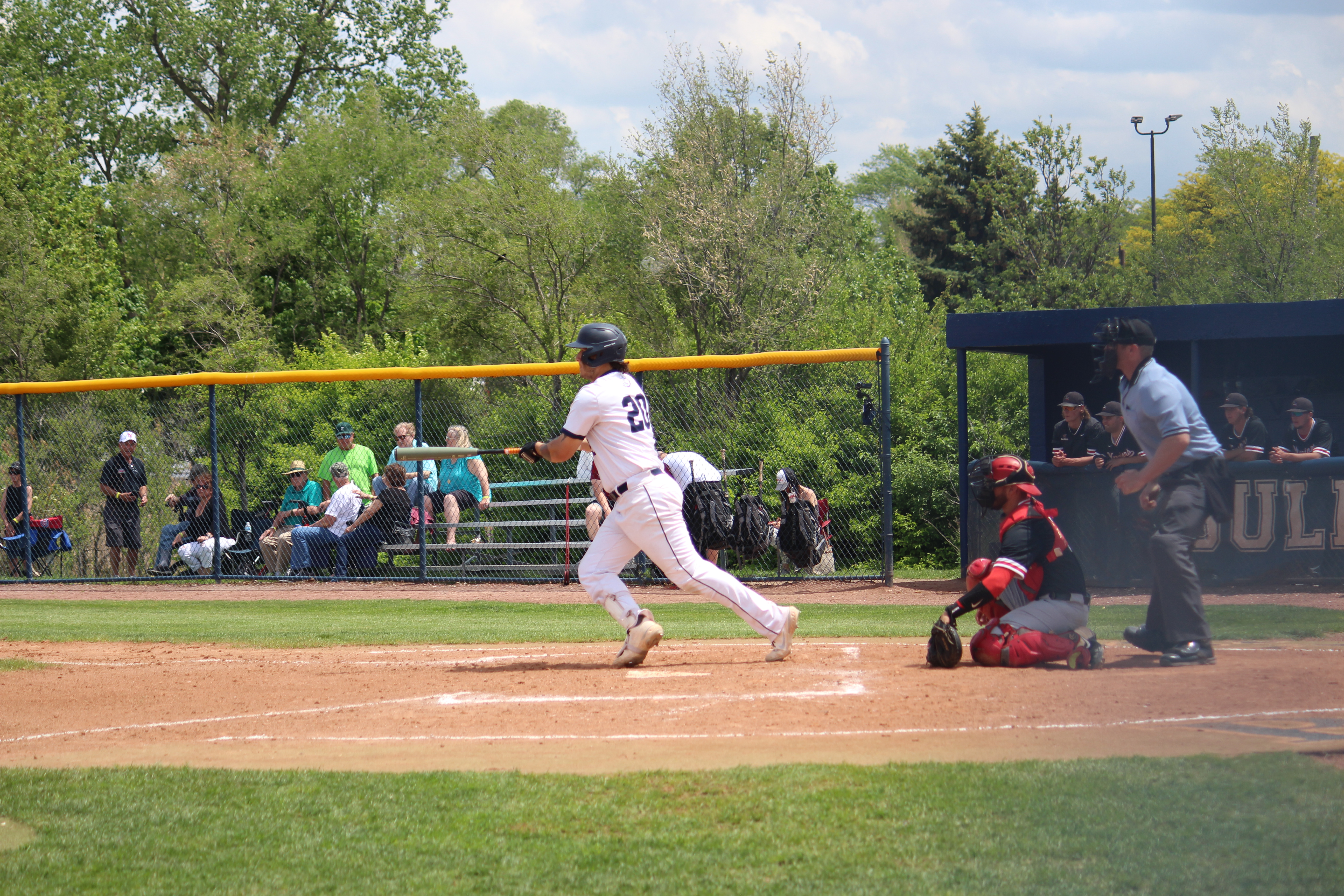 Baseball Player Hitting ball