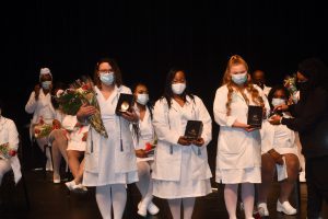 Photo of South Suburban College Associate Degree Nursing graduates receive their pins.