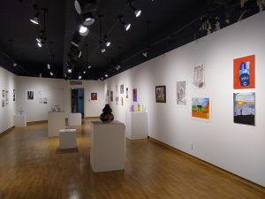 Photo of some of the art in the Bi-Annual Student Art Show
