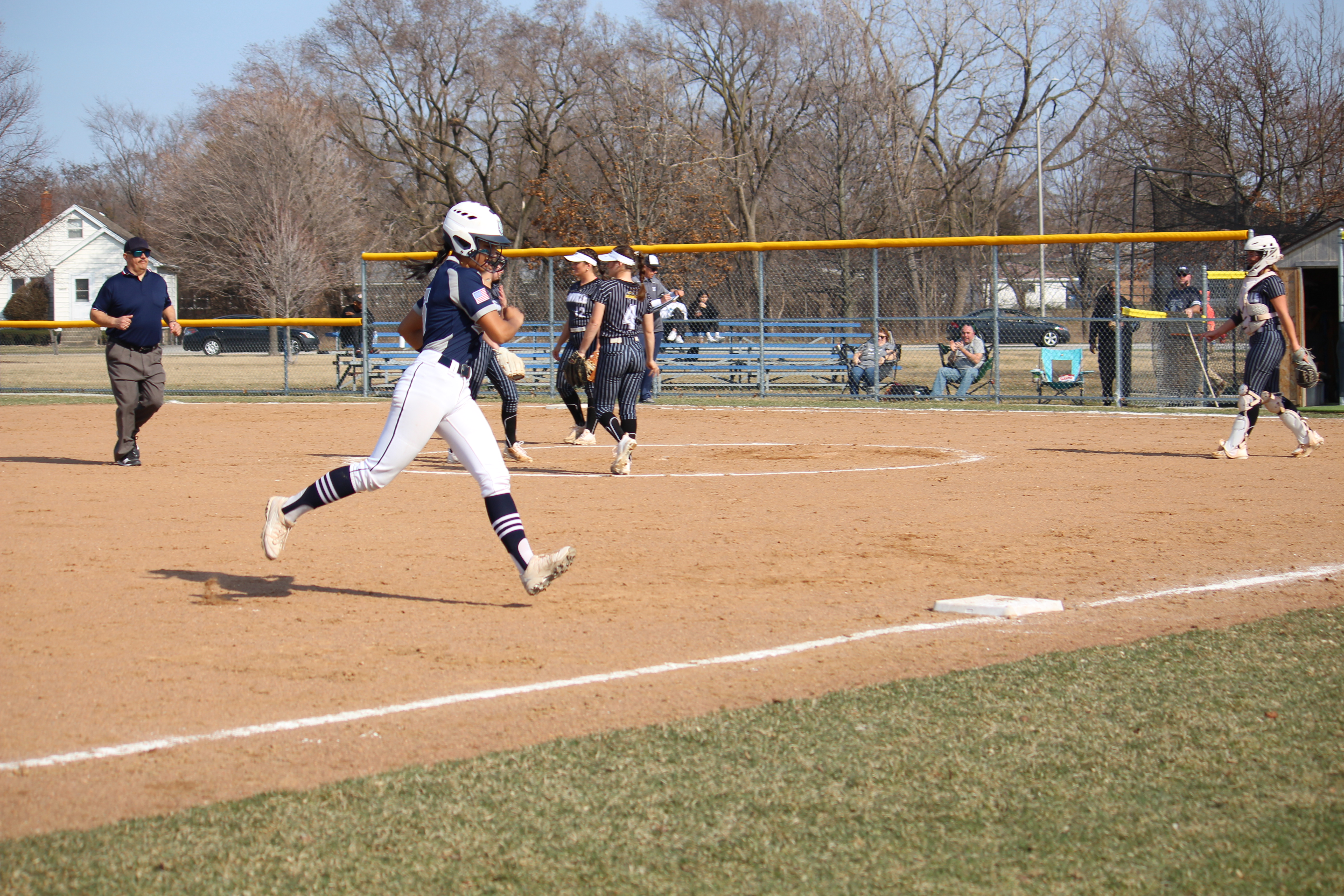 SSC player rounding 3rd Base