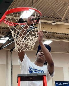 SSC Bulldog forward Damontae Taylor cuts down the net.