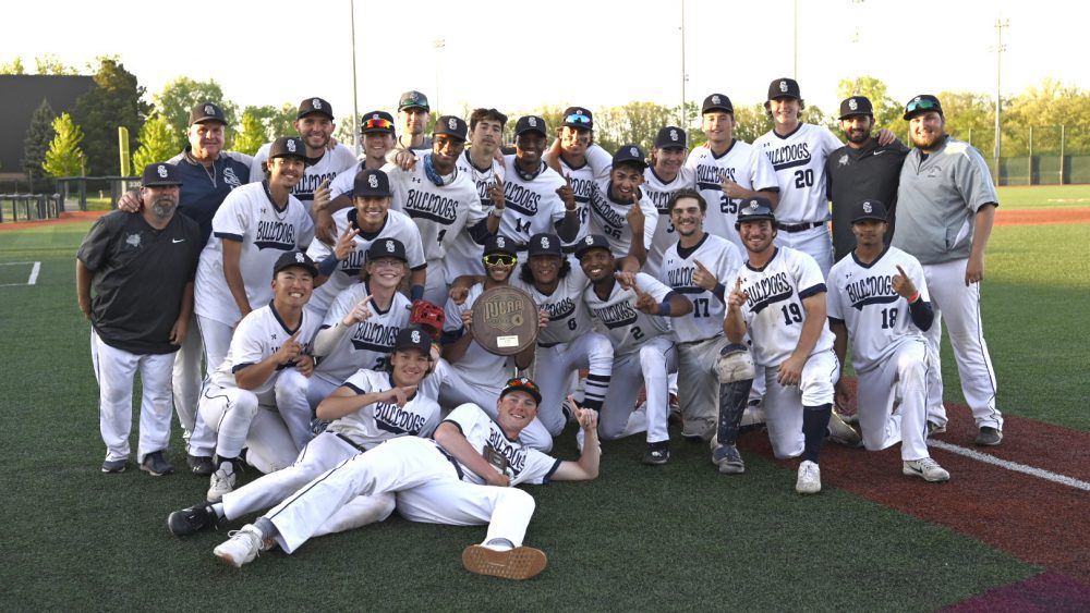 A photo of SSC Bulldogs baseball team with Region IV Trophy