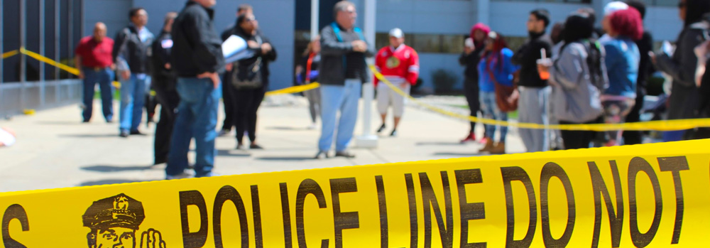 A header showing a SSC Criminal Justice class mocking a crime scene.