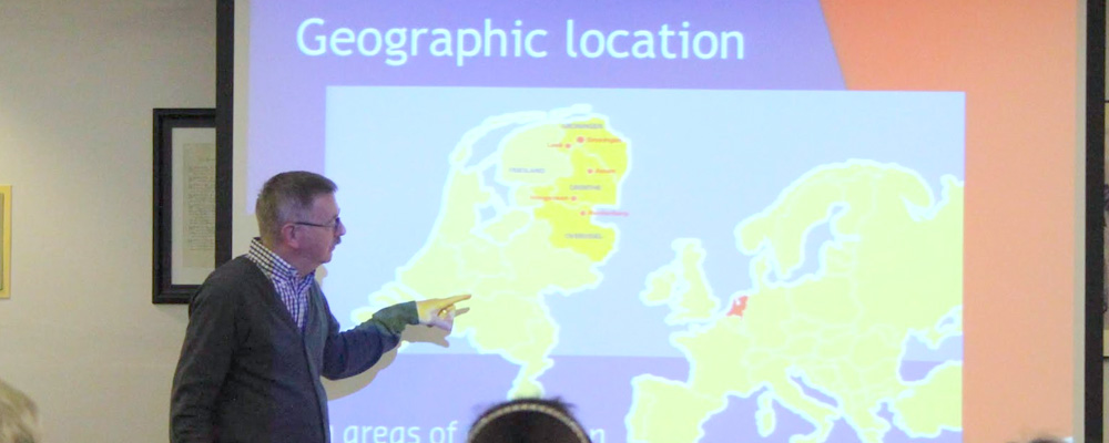 A photo of a Geography instructor in class