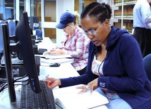 A photo of a SSC Legal Studies Students Studying in the Law Library at the Oak Forest Center.