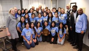 A photo of the SSC Women’s Soccer Team with the Board of Trustees