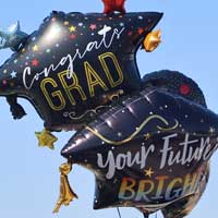 Balloons that say, "Congrats Grad" and "Your Future is Bright".
