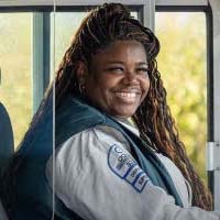 A photo of a happy Pace Bus driver.