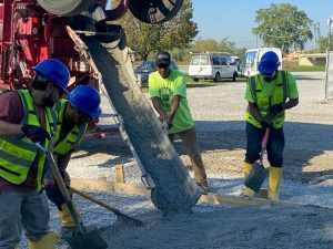 The Highway Construction Careers Training Program (HCCTP) was recently involved in a concrete pouring project at the Center for Hard to Recycle Materials (CHaRM) as part of sustainability initiatives at South Suburban College.