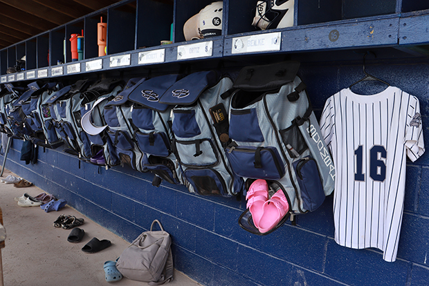 A photo of the SSC Softball Team dugout with Trina Pappas' jersey displayed.