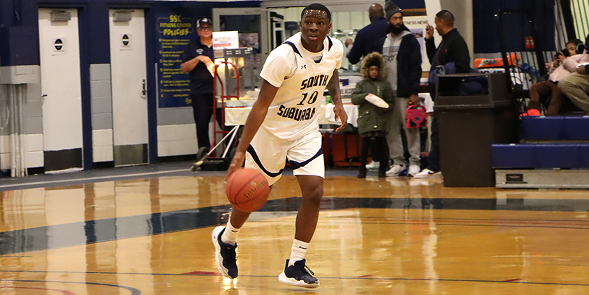 Action shot during a 2025 men's basketball game.