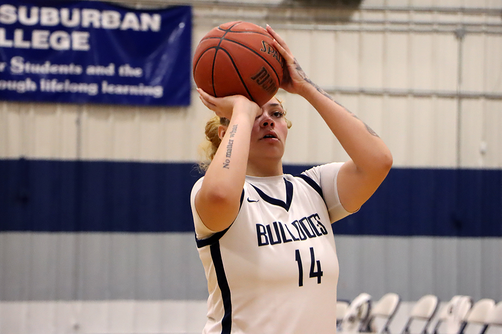 Action shot during a 2025 women's basketball game.