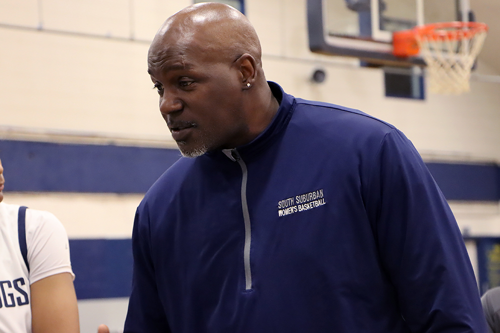 Action shot during a 2025 women's basketball game.