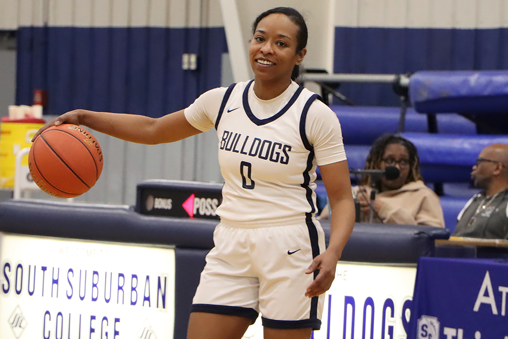 Action shot during a 2025 women's basketball game.