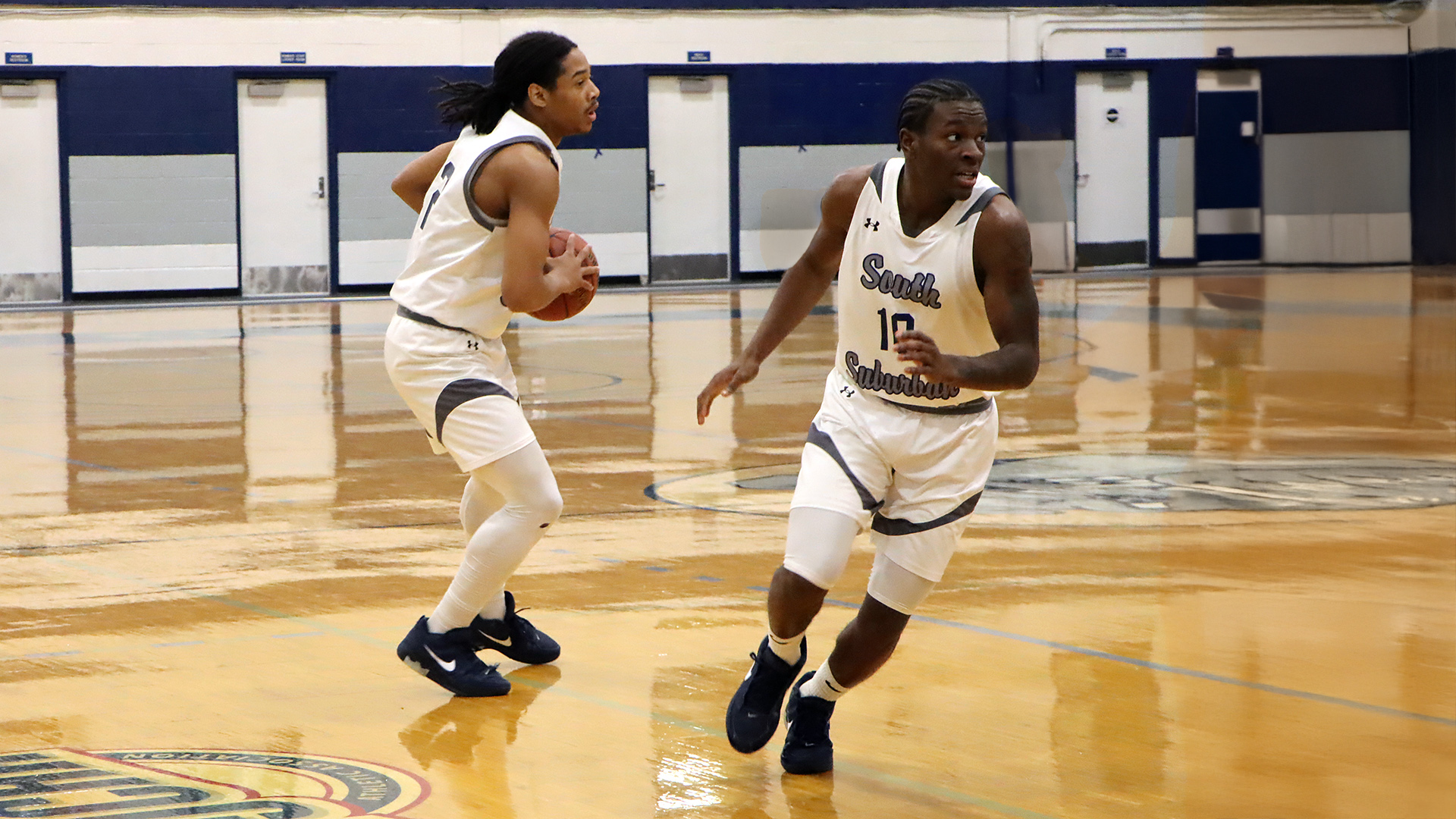 South Suburban College Men's Basketball guards AJ Abrams (left) and Samar Bures (right) push the pace during a home game in the 2025-2026 season.