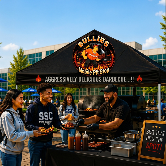 An outdoor catering tent labeled "Bullies Mobile Pit Stop" features a chef serving plates of fresh barbecue to smiling South Suburban College students on a sunny campus plaza.